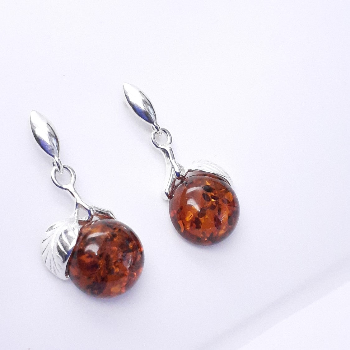 ARETES CIRUELA