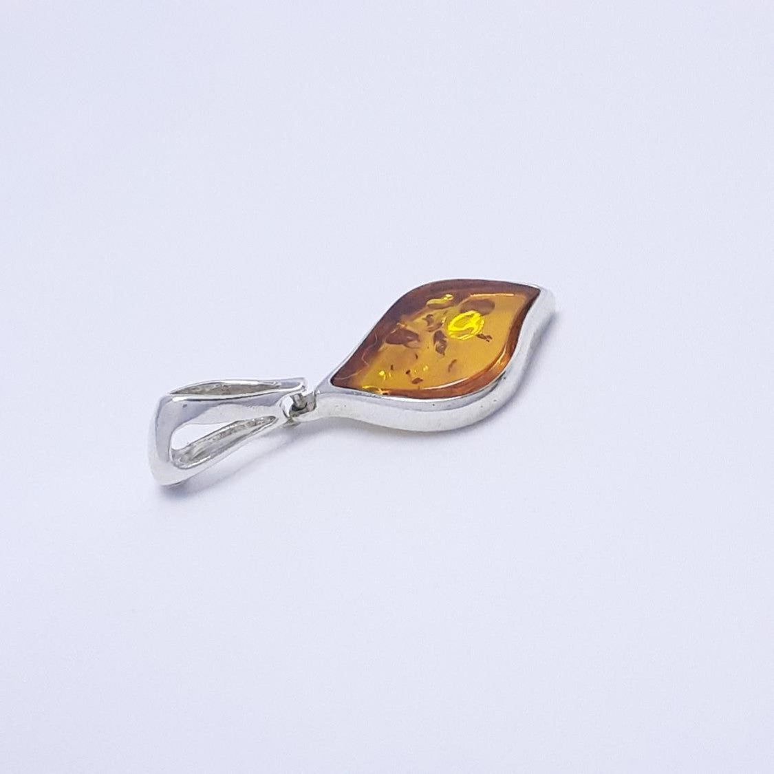 DIJE AMORFO Y PLATA
